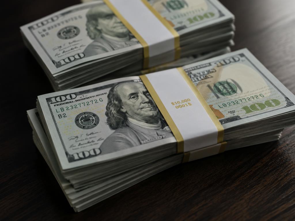 Illustrative image: US$50,000 each to 30 families of fallen national heroes (to be identified and verified)
